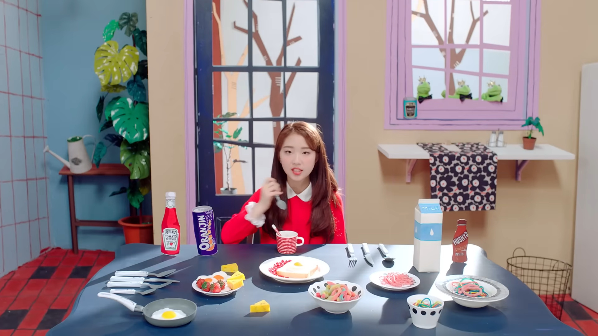 Yeojin sitting at a table in the kitchen.